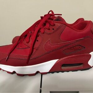 Boys (Big Kid) Nike Red Athletic Shoes